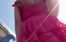 Voyeur Peeking Under A Pink Skirt